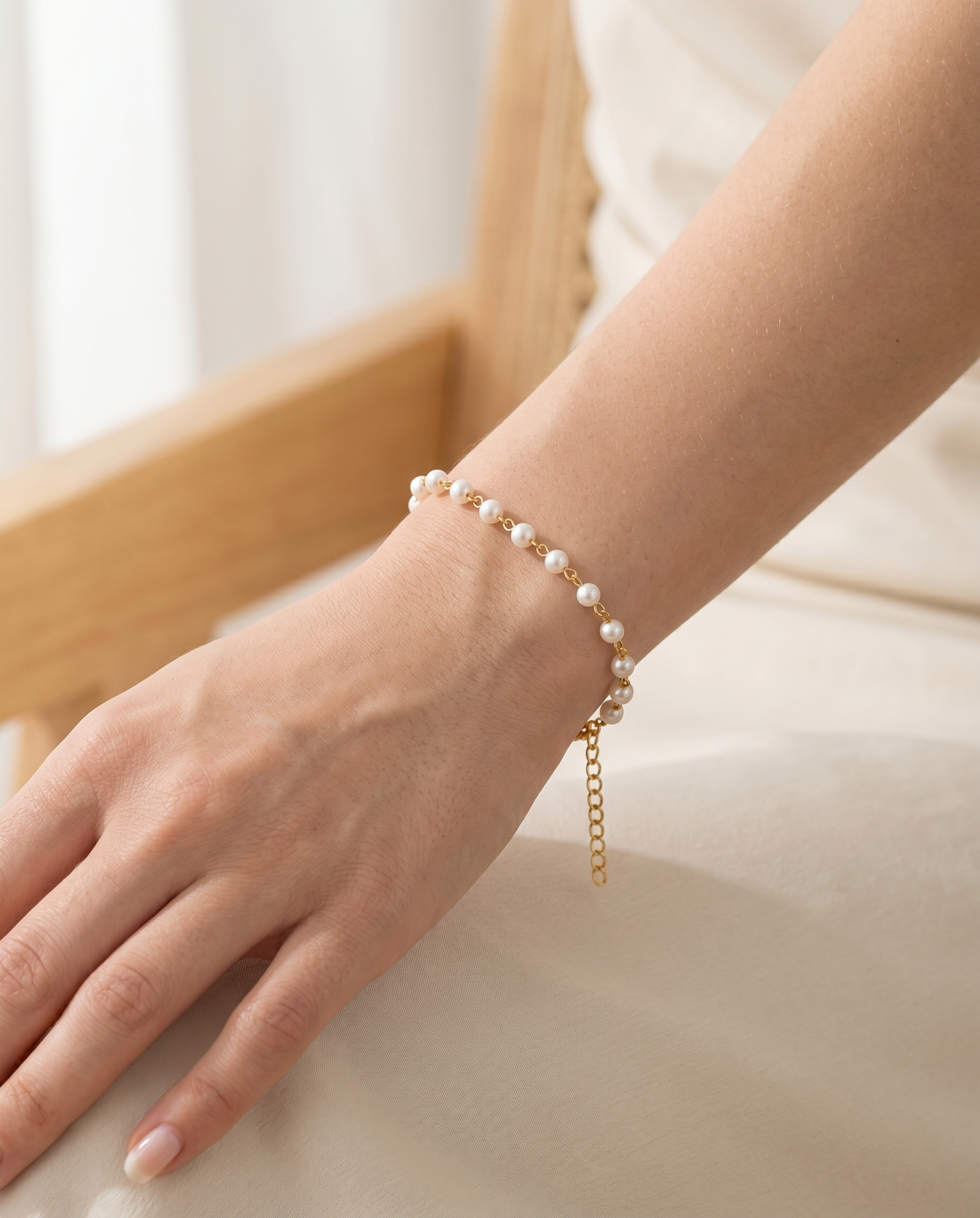 Pulsera de Perlas puesta en la muñeca